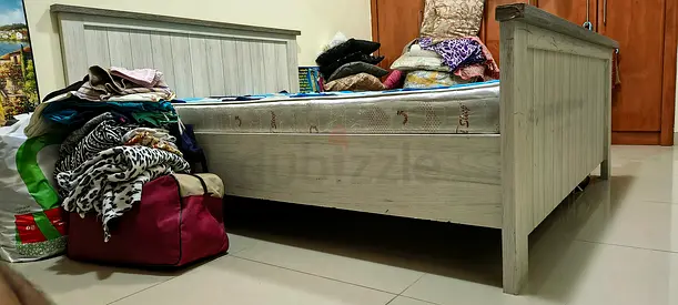 Good condition Home centre cot and mattress included with side table