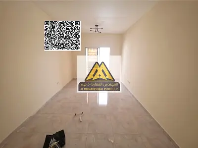 A spacious 1-bedroom apartment with a living room for annual rent in Al Hamidiya 1 – Ajman, located on University Street. It features an open view, a