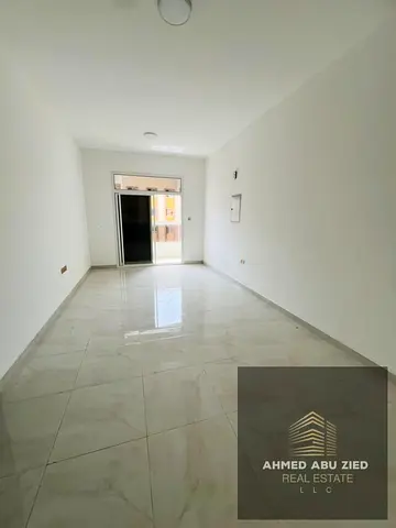 Distinctive apartment for annual rent-Master bedroom-Balcony with open view-payment 4 or6-Prime location close to all services and near the Dubai exit