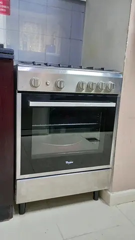 Whirlpool freestanding gas oven and stovetop plus new gas cylinder