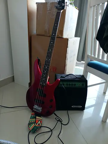 Red 4-String Electric Bass Guitar with Small Practice Amp - Good Condition
