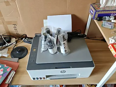 HP All-in-One Ink Tank Printer with Extra Ink Bottles - Good Working Condition