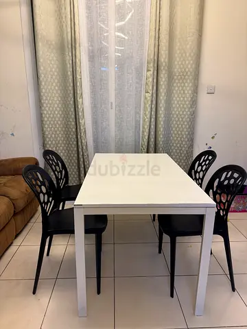 White Dining Table with 4 Black Chairs - Good Condition