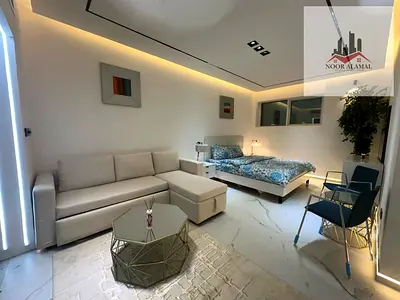 Sharjah Al Khan studio apartment with a large area, kitchen, and bathroom.