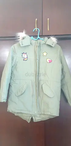 Green kids parka jacket with faux fur hood and patches