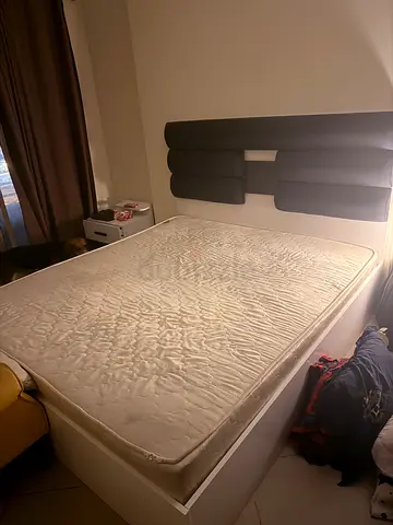 Queen bed frame with mattress and headboard, two side tables and vanity mirror - good condition