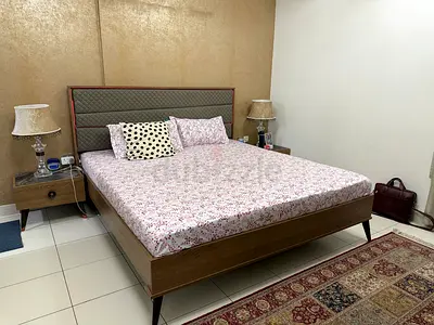 King Size Wooden Bed with Upholstered Headboard in very great condition. Mattress not included.