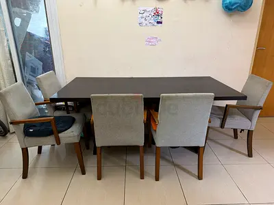 Solid wood dining table with 6 upholstered chairs