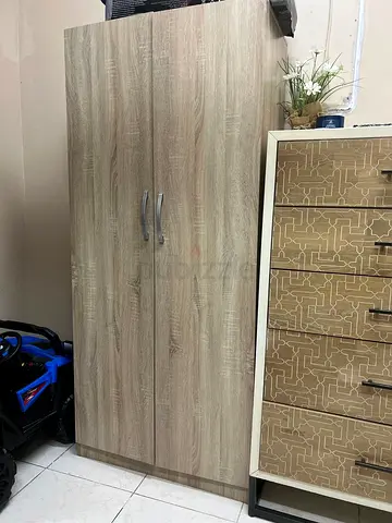 Two-door wooden wardrobe / armoire in good condition