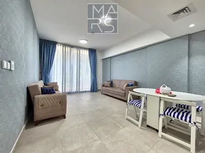 Semi-Furnished 1BR Apartment | Balcony | Pool & Gym