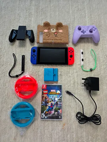 The Nintendo Switch comes with a free additional controller, a Nintendo Switch case, and a free game