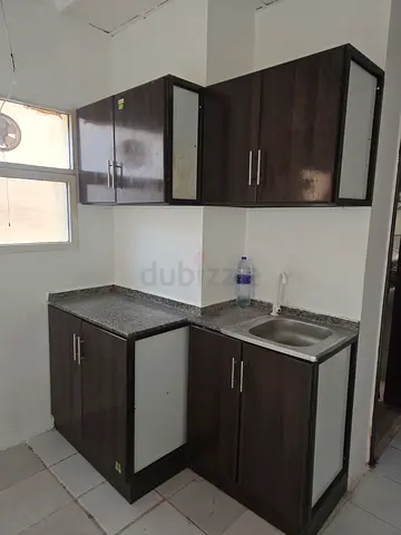 Compact L-shaped Kitchen Cabinet Set with Granite Countertop and Sink