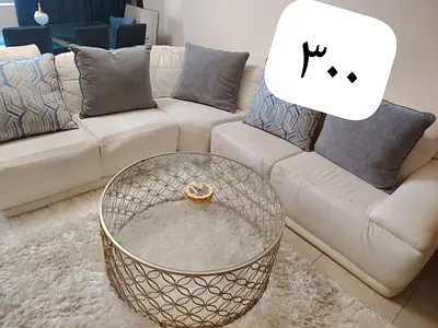 White L-shaped sectional sofa set with cushions - used, good condition