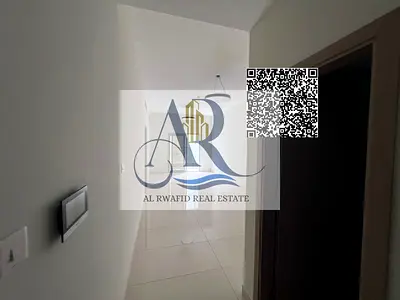For annual rent, two bedrooms and a hall in Al Jarf 2 for 52,000 AED including parking. 3 bathrooms, balcony, central air conditioning,