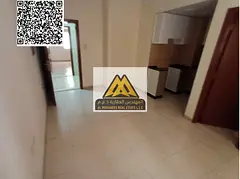 A studio for annual rent in Al Hamidiya 1 – Ajman, featuring a semi-separate kitchen and central A