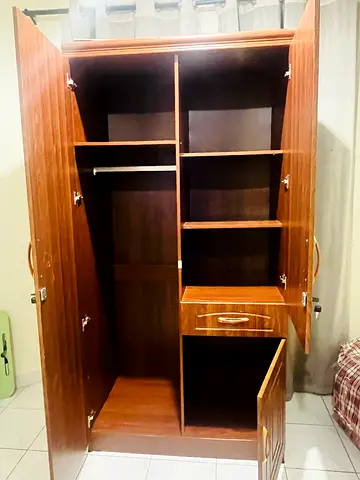 Wooden 2-Door Wardrobe with Shelves and Drawer - Good Condition.Good for clothes hanging and storage