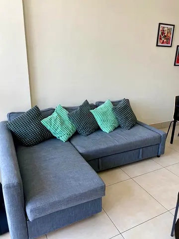 Grey L-shaped Fabric Sofa with Storage - Good Condition