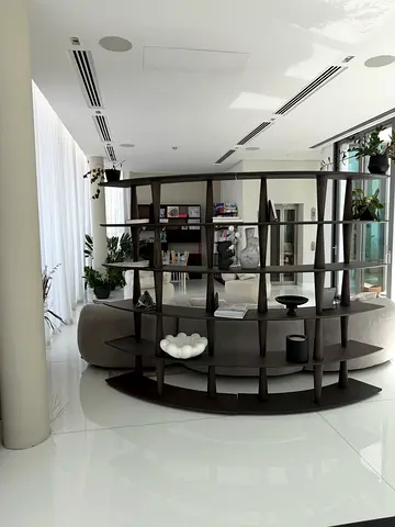 Modern curved open-back shelving unit with wooden divider shelving (set)