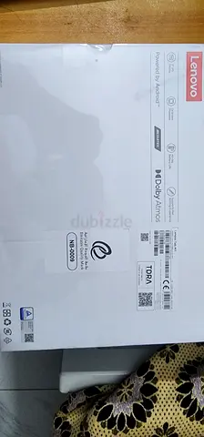 Sealed Lenovo laptop box (Dolby Atmos, Android-powered) — unopened