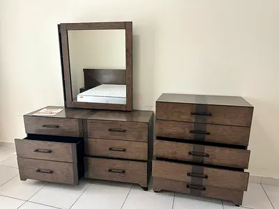 Bedroom Set which includes - 6 drawer dresser with Mirror, king size bed and chest of 5 drawers