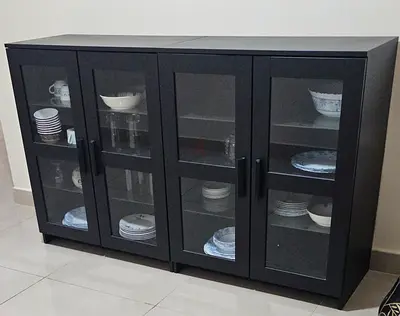 IKEA Wall cabinet with glass doors for sale