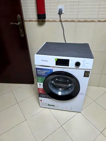 Front-load washing machine (working) - 7kg, energy efficient, hardly used, 1 year warranty