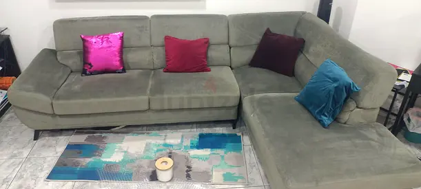 L-shaped grey fabric sectional sofa — 4-seater, good condition