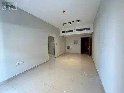 Beautiful 2BR apartment, second tenant, 1 month free, super deluxe finishes, spacious layout, built-in wardrobes, prime location near Dubai & Sharjah