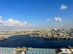 Two bedrooms in Orient Towers, resale at a bargain price. Panoramic view of Ajman Creek.