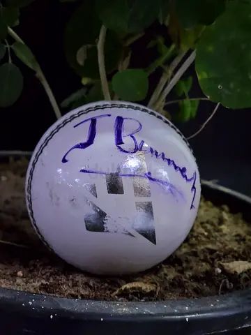 Signed by jasprit bummrah white cricket ball (used) - collectible