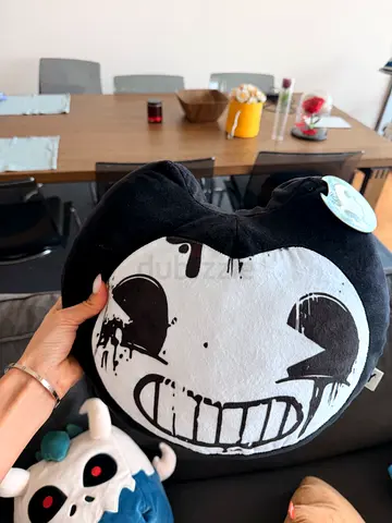 Soft plush character cushion (black  white) - gently used