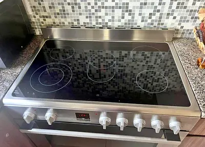 Used stainless steel electric ceramic cooktop with oven - good condition