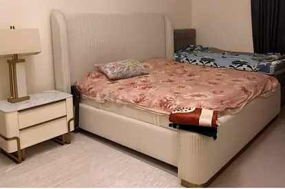 King-size upholstered bed with headboard and mattress - cream