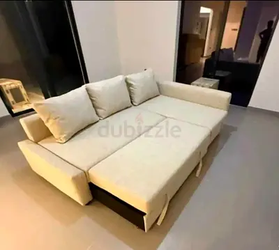 Light beige fabric sofa bed with storage - converts to double