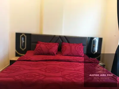 For monthly rent in Ajman, Al Rawda 3: a spacious two-bedroom apartment with a living room, two bathrooms, a master bedroom, luxurious VIP furnishings