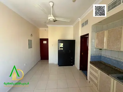 For rent, a studio with a large area and a special location, close to services, behind traffic and near Ajman University in Al Hamidiya 1, for 18,000,