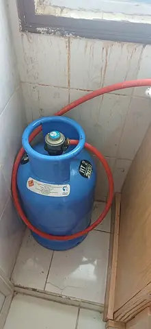 Used Blue LPG Gas Cylinder with Hose - Good Working Condition
