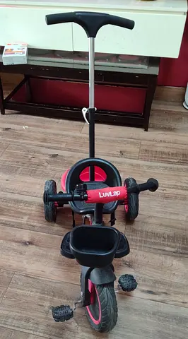LuvLap toddler tricycle with parent push handle — good used condition