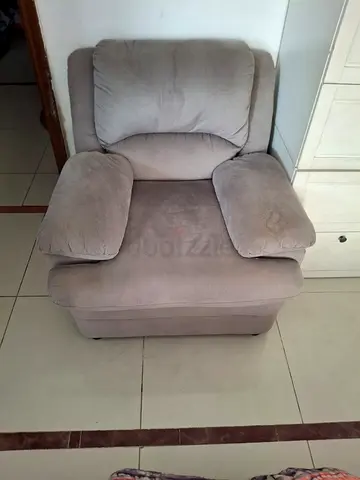 Comfortable single-seater grey fabric armchair - good condition