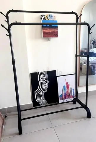 Black Metal Freestanding Clothes Rack with Hooks — Good Condition