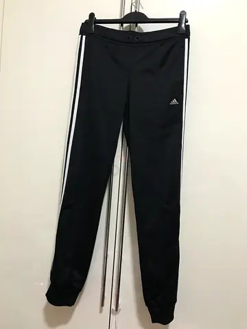 Adidas pants for kids aged 13-14 black color for 60 aed.