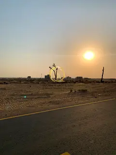 For sale: commercial land in the Rawdat Al-Qurt area. Prime location on a corner of streets 97 / 152