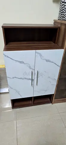 Compact wooden cabinet with marble-effect doors - good condition
