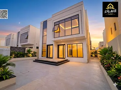 Your dream villa, two floors and a roof, including registration and ownership fees, next to all services, close to Sheikh Mohammed Bin Zayed Road