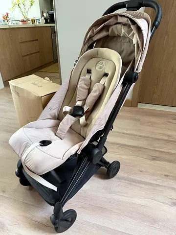 Lightweight beige Cybex stroller in good condition. Coya - cabin approved