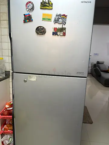 Silver two-door fridge freezer in good working condition
