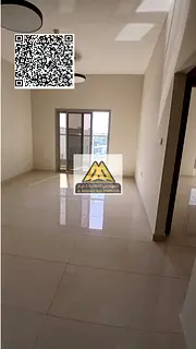 A premium 1-bedroom apartment with a living room for annual rent in Ajman, located in a new tower (s