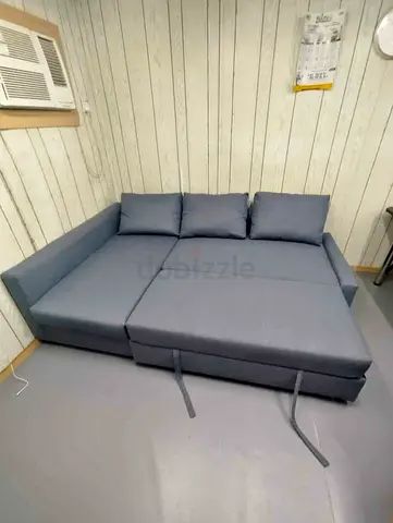 L-shaped Sofa Bed in Grey  Good Condition