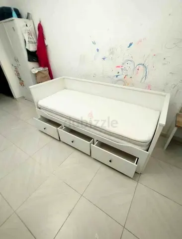 IKEA Hamnes Day bed with 3 storage drawers underneath and with 2 IKEA mattresses is available