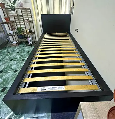 Ikea black single bed with mattress underneath 2 storage drawers available in perfect condition